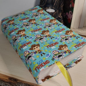 Book cover, adjustable book cover, book protector, Toys Story, cotton, gift idea, integrated bookmark