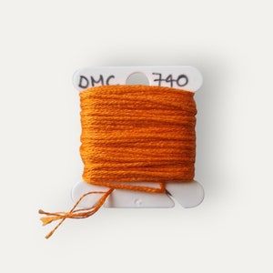 DMC 740 orange stranded cotton thread for hand embroidery or cross stitch