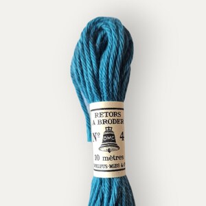 May include: A teal embroidery thread skein with a paper label. The label reads "RETORS A BRODER" and "Nº 4". The thread is 10 metres long. The brand name "Bailey Whin Supplies" is printed at the bottom.