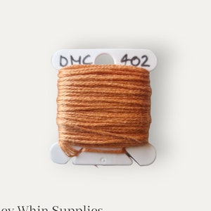 DMC 402 orange stranded cotton thread for hand embroidery or cross stitch