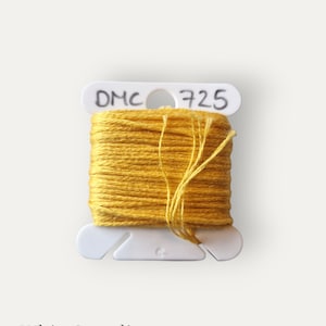 DMC 725 yellow stranded cotton thread for hand embroidery or cross stitch
