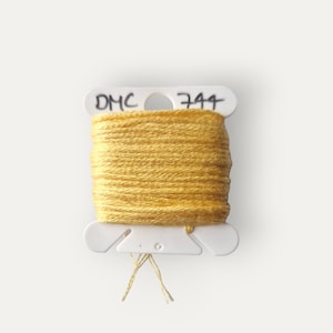 DMC 744 yellow stranded cotton thread for hand embroidery or cross stitch
