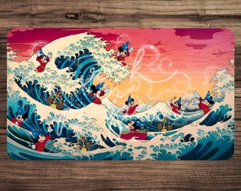 May include: A colorful illustration of Mickey Mouse as a sorcerer, riding a large wave with a red, orange, and pink sunset in the background. Mickey is depicted in various poses, casting magic spells with a wand.