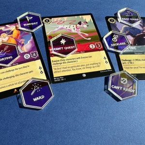SINGLES: Tokens de expansão de status iridescente e modificador de palavra-chave para Lorcana TCG