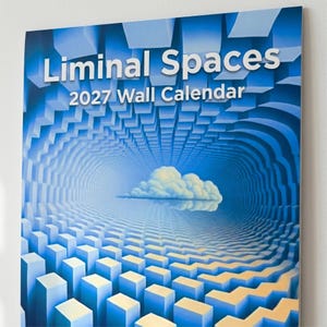 May include: A 2027 wall calendar titled Liminal Spaces. The cover features a surreal blue tunnel composed of repeating block shapes that recede into the distance, with a single fluffy white cloud floating in the center of the tunnel opening.