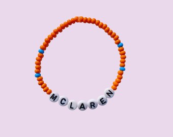 Pulsera de cuentas McLaren: joyería elástica naranja y azul para aficionados a la F1. Regalo hecho a mano para los amantes del automovilismo.