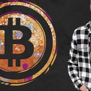 May include: A Bitcoin logo graphic on a black t-shirt, with a matching design on a black background. The Bitcoin symbol is in the centre, surrounded by a colourful, abstract design. A person is wearing the t-shirt and a black and white plaid shirt.