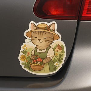 Pegatina de un lindo gato con una cesta llena de setas: pegatina de dibujos animados de estilo granja para coche, portátil, scrapbooking y motivos infantiles de animales.