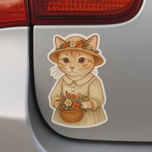 Pegatina de un lindo gato con una cesta llena de setas: pegatina de dibujos animados de estilo granja para coche, portátil, scrapbooking y motivos infantiles de animales.