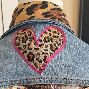 Girl’s size M up cycled cheetah denim jacket