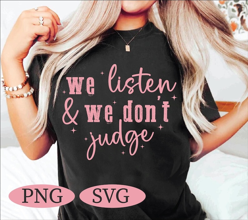 May include: Black t-shirt with pink text that reads "We listen & we don't judge". The text has a distressed look and is surrounded by small stars. The shirt is available in PNG and SVG formats.