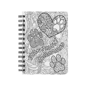 May include: A black and white spiral bound notebook with a paw print and heart design. The text "Veterinary Technician" is written on the cover.