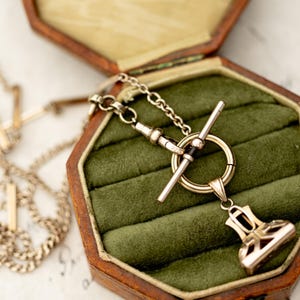 Collar con cadena de reloj antigua victoriana chapada en oro Albert Fob, largo ópera, joyería de colección