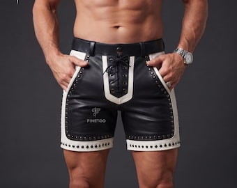 Peut inclure: Short noir et blanc avec une fermeture à lacets sur le devant, une ceinture noire unie et des clous métalliques argentés le long des poches et de l'ourlet. Le texte FINETOO est imprimé en blanc sur le panneau avant de la jambe gauche.