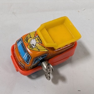 vintage Japanese wind-up tin toy truck