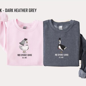 Our "MR & MRS SILLY GOOSE" matching sweatshirts are the perfect way to celebrate love with a side of humor. Featuring hand-drawn, adorable geese (complete with veil and all!) and the cute title “Silly Goose,” these cozy sweaters are sure to bring smiles wherever you go.