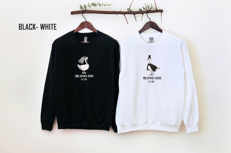Our "MR & MRS SILLY GOOSE" matching sweatshirts are the perfect way to celebrate love with a side of humor. Featuring hand-drawn, adorable geese (complete with veil and all!) and the cute title “Silly Goose,” these cozy sweaters are sure to bring smiles wherever you go.