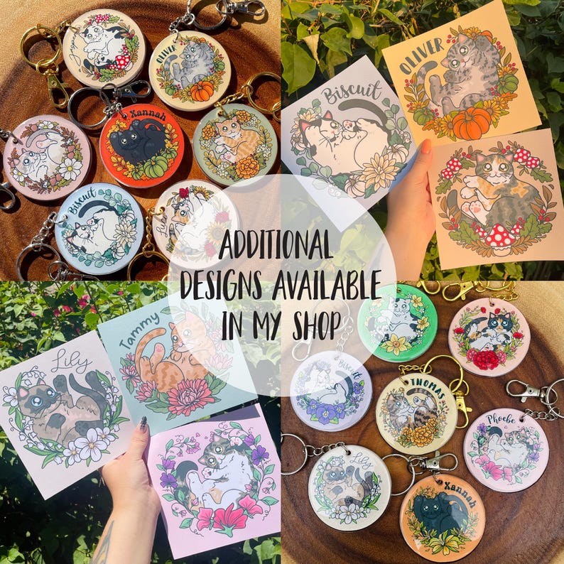 May include: A collection of colorful cat-themed keychains with different names, including Biscuit, Oliver, Hannah, Tammy, Lily, Thomas, Phoebe, and Sannah. The keychains feature illustrations of cats in various poses and settings, with some including flowers, hearts, and other decorative elements. The text "ADDITIONAL DESIGNS AVAILABLE IN MY SHOP" is displayed in the center of the image.