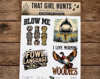 May include: A sheet of waterproof vinyl stickers titled That Girl Hunts Waterfowl Collection. The sheet features four distinct designs including three camouflage duck calls, a duck tail with the text Bottoms Up, Fowl Language text, and a wood duck with the text I Love Morning Woodies.