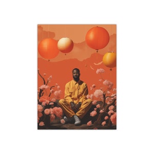 May include: A poster featuring a person in a yellow jumpsuit sitting cross-legged in front of an orange background. Overhead, several orange and white paper lanterns hang. The scene is framed by pink flowers and branches.