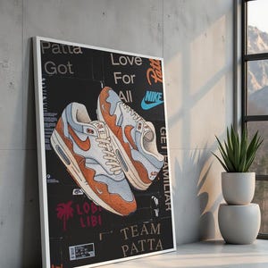 Oryginalny obraz akrylowy przedstawiający Nike x Patta Air Max 1 Waves Monarch na pudełku na buty Nike x Patta Air Max 1 Waves Monarch z etykietą (50 x 70 cm)