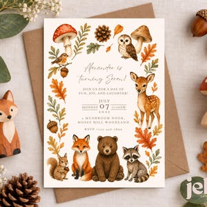 Pode incluir: Um cartão de convite de aniversário retangular com ilustrações em aquarela de um cervo, raposa, urso, guaxinim, esquilo, coruja e pássaro cercados por cogumelos, bolotas e folhas. O texto diz Alexander is turning Seven, Join us for a day of fun, joy, and laughter, July 7, 2025, 11:00 AM, 1 Mushroom Nook, Mossy Hill Woodland, RSVP 123-456-7890.