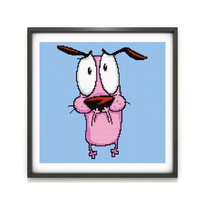 May include: A framed pixel art print featuring Courage the Cowardly Dog. The pink dog has large white eyes, a red nose, and is framed against a light blue background. The black frame adds a clean border to the artwork.
