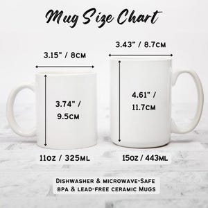May include: A size chart for two white ceramic mugs. The smaller mug is 11 ounces and 3.74 inches tall. The larger mug is 15 ounces and 4.61 inches tall. Both mugs are dishwasher and microwave safe and made of BPA and lead-free ceramic.