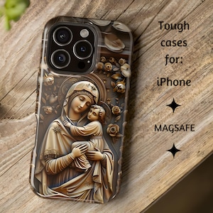 May include: A phone case with a religious image of a woman and child, with the text "Tough cases for: iPhone MAGSAFE". The case has a clear border and a wooden background.
