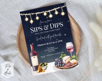 May include: A rectangular party invitation card with a dark blue background featuring string lights, a red wine bottle, a glass of red wine, a bowl of olives, crackers, and a charcuterie board with cheese, grapes, and salami, with text reading SIPS & DIPS.