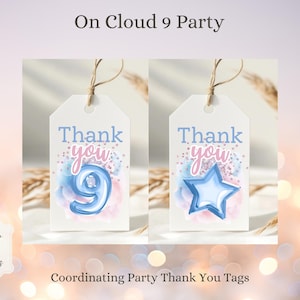 May include: Two rectangular white paper gift tags with twine loops. Each tag features the text Thank you in blue and pink, with watercolor-style blue and pink splashes and glitter accents. One tag displays a blue number 9, the other a blue star.