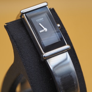 Citizen Eco-Drive Silhouette damestankarmbandhorloge zwarte wijzerplaat roestvrij staal G620