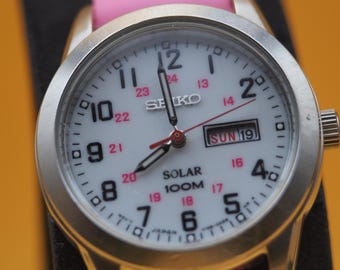 Seiko Solar SNE233 White Dial Day-Date | LumiBrite | 100M Water Resistant | Field Watch | Pre-Owned