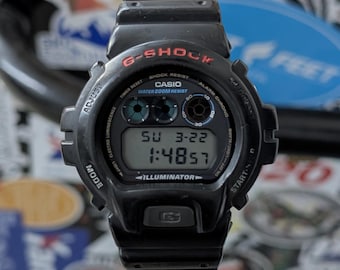 Zegarek cyfrowy Casio G-Shock DW-6900 w kolorze czarnym, w pełni serwisowany, wodoodporność do 200 m