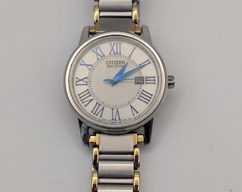 Dwukolorowy damski zegarek Citizen Eco-Drive | Niebieska tarcza w jodełkę z cyframi rzymskimi