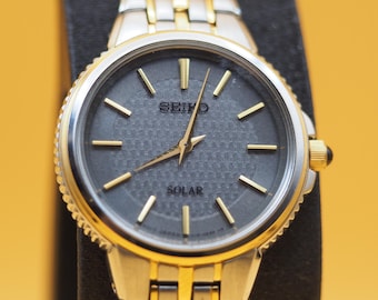 Seiko Solar SUP863P1 | Gray Textured Dial | Two-Tone Bracelet | Ladies Dress Watch | Pre-Owned | 2010s