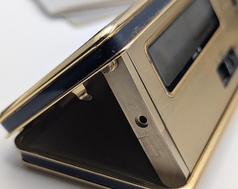 Składany budzik podróżny Seiko Quartz w kolorze granatowo-złotym | Alarm z dwoma wyświetlaczami LCD | Oryginalne pudełko