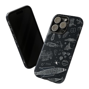 May include: Two black phone cases, one with a clear back and the other with a white space-themed design. The design features illustrations of rockets, satellites, and other space-related objects.
