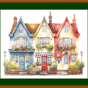 Puede incluir: Una ilustración de acuarela de tres casas coloridas con molduras blancas, cada una con una puerta y ventanas. Las casas están rodeadas de arbustos y flores verdes.