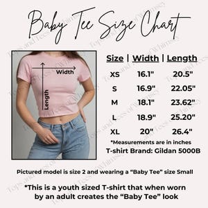 May include: A size chart for a "Baby Tee" style t-shirt, showing measurements in inches for width and length. The chart includes sizes XS, S, M, L, and XL. The chart also states that the t-shirt brand is Gildan 5000B. A model is wearing a pink "Baby Tee" with blue jeans.