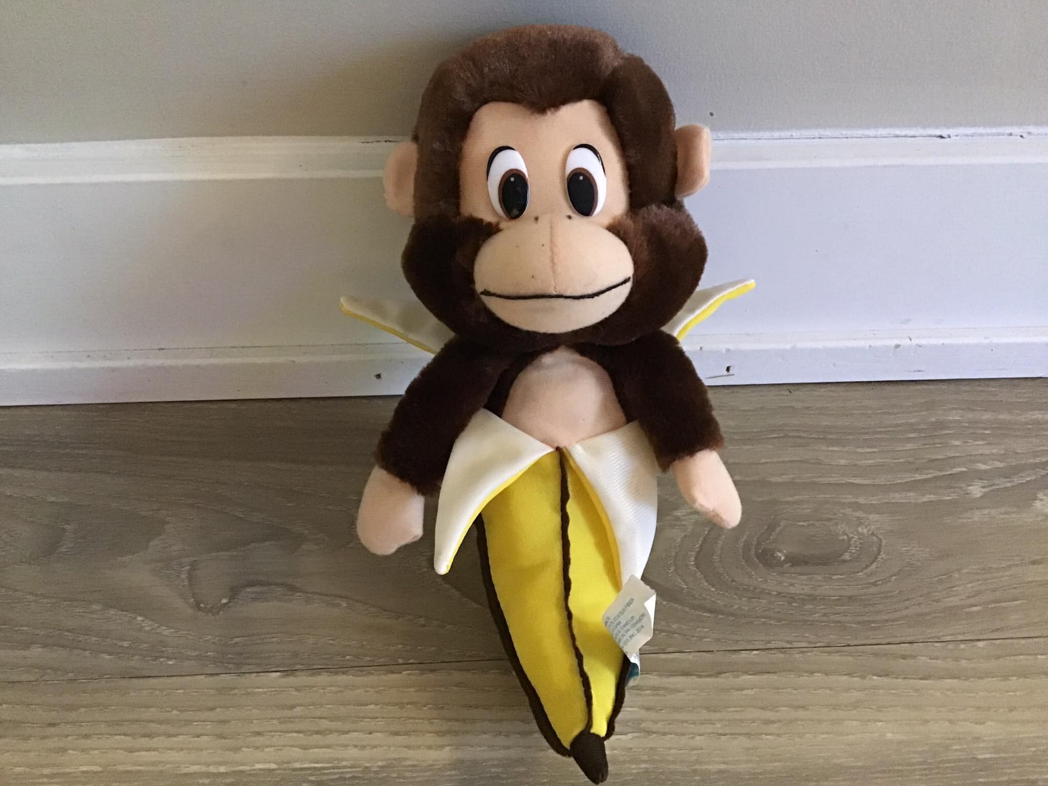 Stuffed toy monkey with banana sale