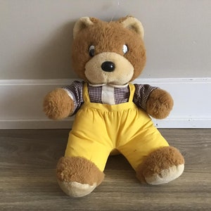 Vintage 1988 Jolly Toys Teddy Bear with Yellow overalls Stuffed Animal Plush Toy 13.5&quot;