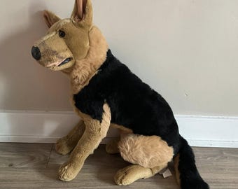 Peluche grande y realista de perro pastor alemán