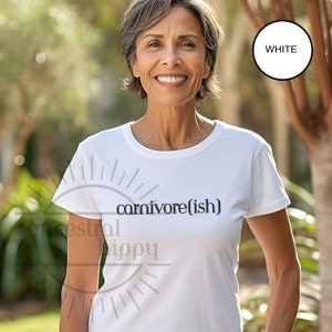 May include: White t-shirt with the text "carnivore(ish)" printed on the front.