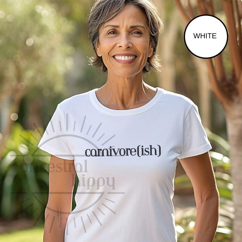 May include: White t-shirt with the text "carnivore(ish)" printed on the front.