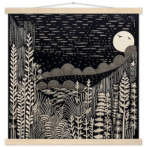 May include: Monochrome art print depicting a night scene with a full moon, birds, and detailed plant life. The print is mounted on a wooden frame with a hanging string. The artwork's design evokes a tranquil, natural theme, with a minimalist style.