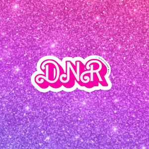 May include: Pink and white sticker with the text "DNR" in a stylized font. The sticker is on a sparkly pink and purple background.