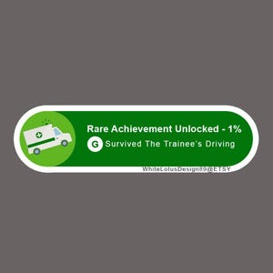 May include: A green and white sticker with the text "Rare Achievement Unlocked - 1%" and "Survived The Trainee's Driving". The sticker also features a cartoon ambulance and the Etsy shop name.