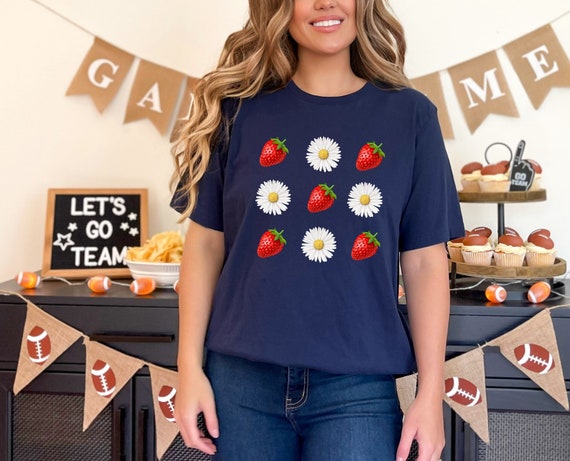 Strawberry and Daisy Delight: A Bella Canvas T-Shirt with Vibrant Fruit and Flower Design