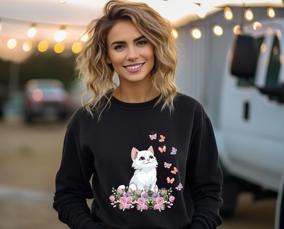 Whimsical Cat in Flower Garden: Cozy Sweatshirt with Butterfly Detail